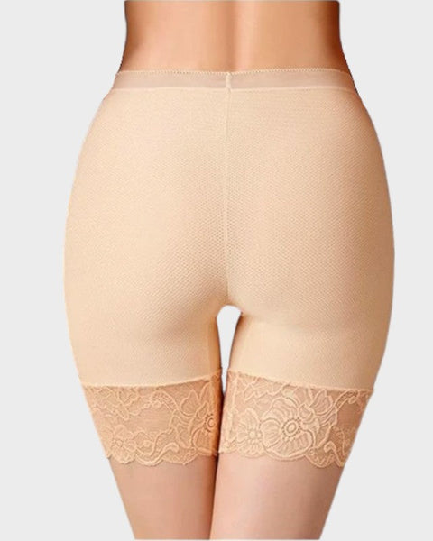 Huidskleurige ondershort onder jurk